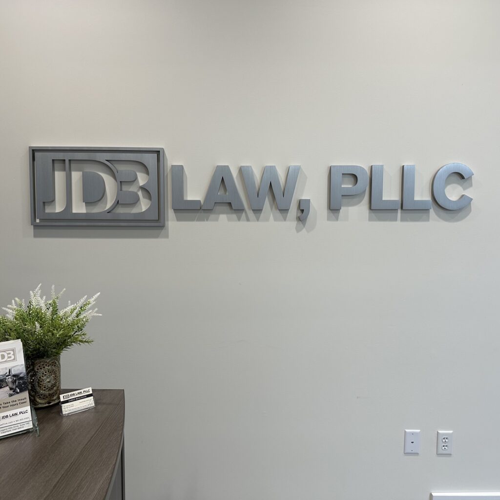 Example of dimensional metal letters for JDB Law, PLLC. They are brushed silver.